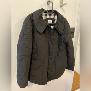 Black quilted jacket by Tach Clothing